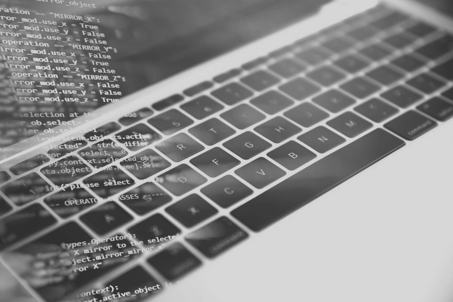 Modern office workspace with financial documents and computer systems